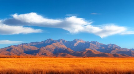 Fototapeta premium Stunning Autumn Landscape: Golden Fields & Majestic Mountains