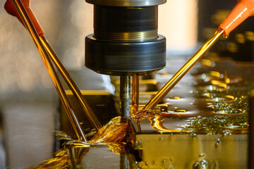 The CNC milling machine finishing cut the mold parts with liquid coolant method.