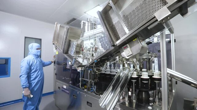 Cream paste filling machine. plastic tubes in paste filling machine. cream, ointment, gel filling machine. sealing plastic tubes, filling and sealing tubes automatic. pharmaceutical production	