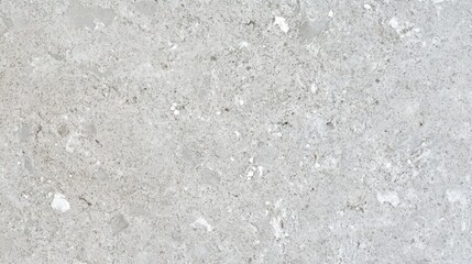Unique texture of smooth light gray concrete from a top view showcasing natural details and subtle imperfections under diffused lighting