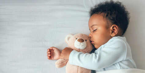 Peaceful sleep of african baby with plush bear in cozy atmosphere