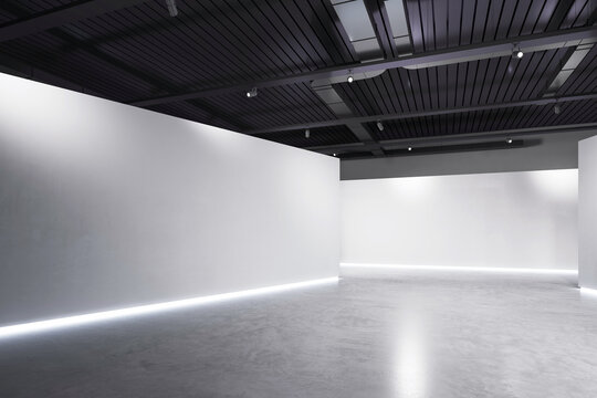 Modern interior of an empty gallery with clean white walls and polished concrete floor. 3D Rendering