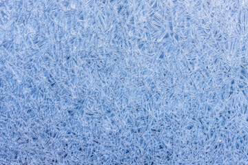 Close-Up of Intricate Ice Crystals. A stunning macro shot of delicate ice crystal formations...