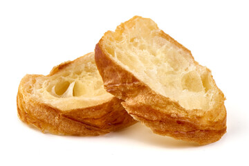 Freshly baked baguette slices, isolated on white background.