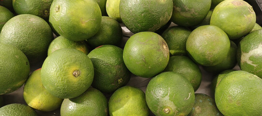 Close up of fresh oranges fruit on grocery store