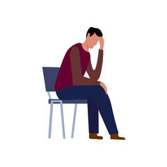 person sitting on a chair with sadness