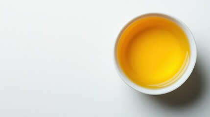 Fresh Organic Olive Oil in White Bowl on Minimalist Background