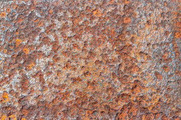 rusted and pitted old metal background texture 