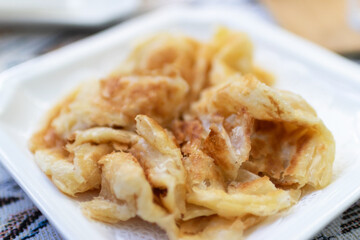 Roti with sweetened condensed milk. Popular street snack in Thailand.