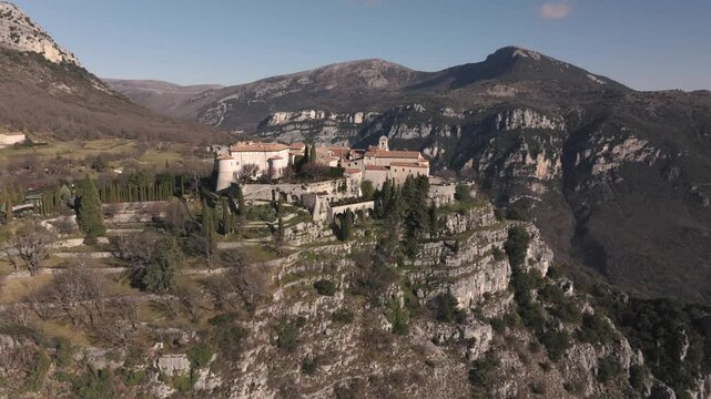 View of French village overlooking the rocky hills, video footage, Gourdon, France, 4K