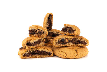 Chocolate cookies with chocolate filling isolated, brown round biscuits, broken sweet cocoa pastry