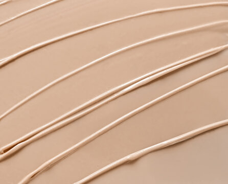 Smeared texture of BB face cream, tonal foundation is smudged.