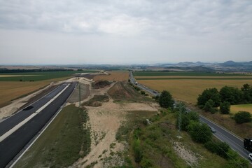 D7 motorway is a highway northwest from Prague to Chomutov and the German border,building of new highway by Louny city,speed road construction work with bridges and modern infrastructure,Czech-Europe	
