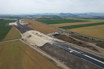 D7 motorway is a highway northwest from Prague to Chomutov and the German border,building of new highway by Louny city,speed road construction work with bridges and modern infrastructure,Czech-Europe	
