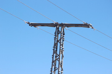 An electric pole with wires