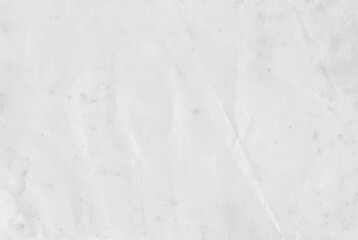 Old worn crumpled light paper background texture. Vintage gray dirty sheet