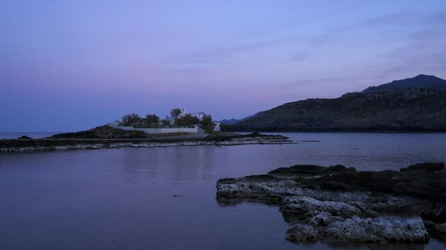 Saint Fokas orthodox chapel in the coast of Greece at sunset