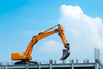Construction equipment operates on a bright day at a building site with clear skies
