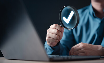 checklist, checkbox, document, plan, tick, choose, check, choice, find, search. A man is holding a...