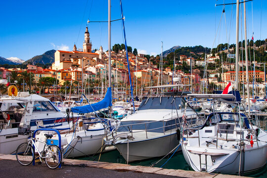 Mentone -charming coastal town resort in French riviera. view of marine with sail boats and colorful houses. Cote d'azure, Alpes-maritimes, France