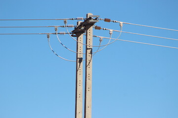 An electric pole with wires