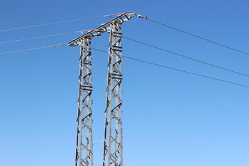 An electric pole with wires