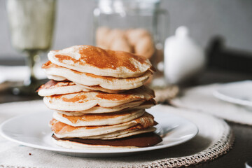 Hot homemade stack of pancakes on plate. High quality photo