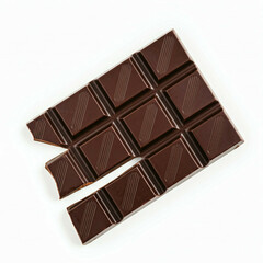 Fototapeta premium close up of a broken dark chocolate bar on a white background