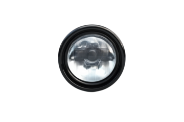 Round automotive headlight with a clear lens for enhanced visibility during nighttime driving