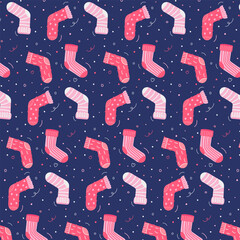 Pattern with socks in pink tones on a dark blue background in doodle style