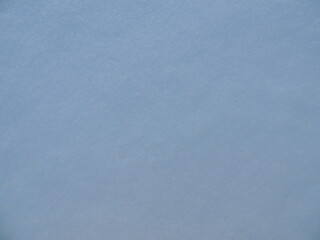 light blue snow background with light sparkling surface texture, airy shining backdrop, fresh snow crust as natural texture space