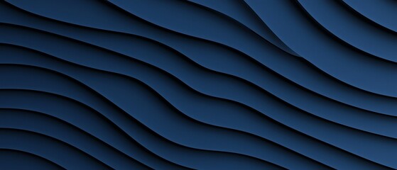 Obraz premium A visually appealing abstract background featuring flowing, wavy patterns in deep blue tones. Perfect for use in design projects seeking a modern and dynamic aesthetic.