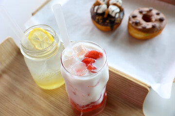 Strawberry latte and lemon tea ice and donut