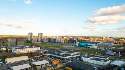 Aerial photo from drone to the modern district of Skanste in Riga. The Skanste district is also home to the large Arena Riga. Riga, Latvia (Series) © Sandis