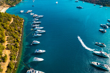 Paradise Bay (Turkish: Cennet Koyu) in Bodrum. Mugla, Turkey. One of the most beautiful bays in Bodrum with blue sea and nature. Drone shot.