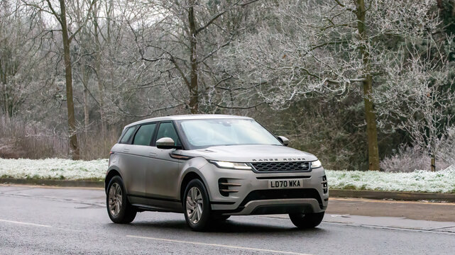 Milton Keynes,UK - Jan 12th 2025: 2020 hybrid electric Range Rover Evoque   car driving on a cold,frosty morning