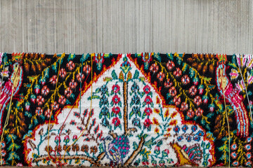 Partially completed knotting threads for carpet on loom in factory near Giza Egypt