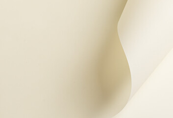 Ivory cream paper background with a smooth, matte texture and folded curves. Light beige tones and...