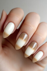 A nuanced nail design using caf&eacute; au lait, ivory and beige colors. Make sure the boundaries between each color are blurred to create a gradient effect. Design each finger differently. General layout Th