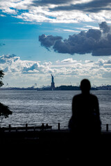 Silhouette of Person Looking at Statue of Liberty New York © Angela Gonzalez 