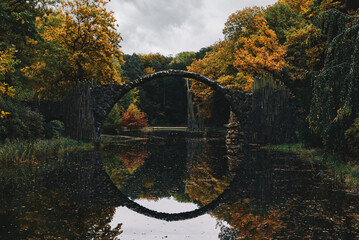 Spectacular autumn landscape with a view on Devli's Bridge in Germany