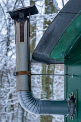chimney feed in the park in winter