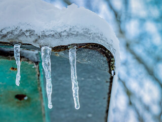 icicles on an old roof