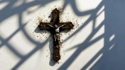Ashes Form a Crucifix Silhouette on a White Background Symbolizing Reflection During Ash Wednesday and Easter Celebrations