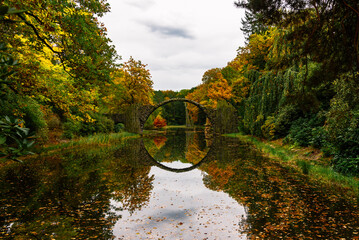 Spectacular autumn landscape with a view on Devli's Bridge in Germany