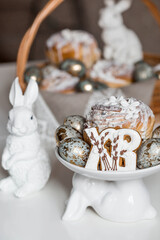 Banner for Orthodox Easter. Easter eggs with gold, Easter cakes and gingerbread in the shape of the letters XB in a woven basket made of vines.