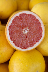 Half of grapefruit on top of others, Sicily, Italy