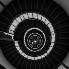 Fototapeta premium circular monochrome pattern, concentric rings, hypnotic spiral, geometric design, black and white, intricate details, optical illusion, symmetrical composition, abstract art, radial structure, futuris