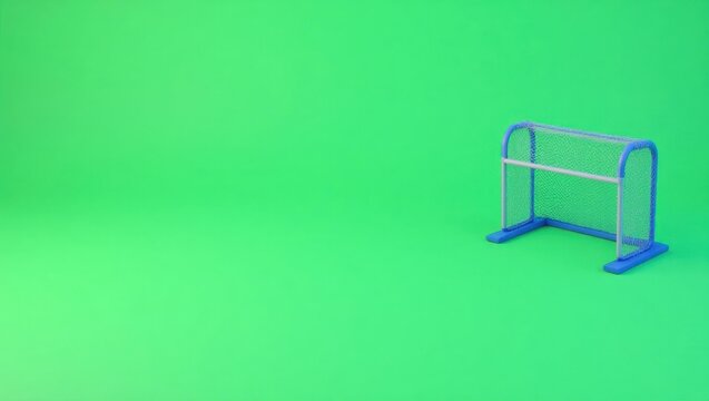 Blue soccer goal on left. Blue push-up bars fitness equipment on green