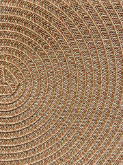 Fototapeta premium Rattan texture, detail handcraft bamboo weaving texture background. include clipping path, woven bamboo mat, footrest, natural texture 
